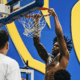 Cam Corhen dunks home a basketball at his new school, Pitt, after transferring from Florida State.